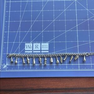 Vintage Enco 14 charms bracelet 6.5” fold over closure brutalist silvertone EUC